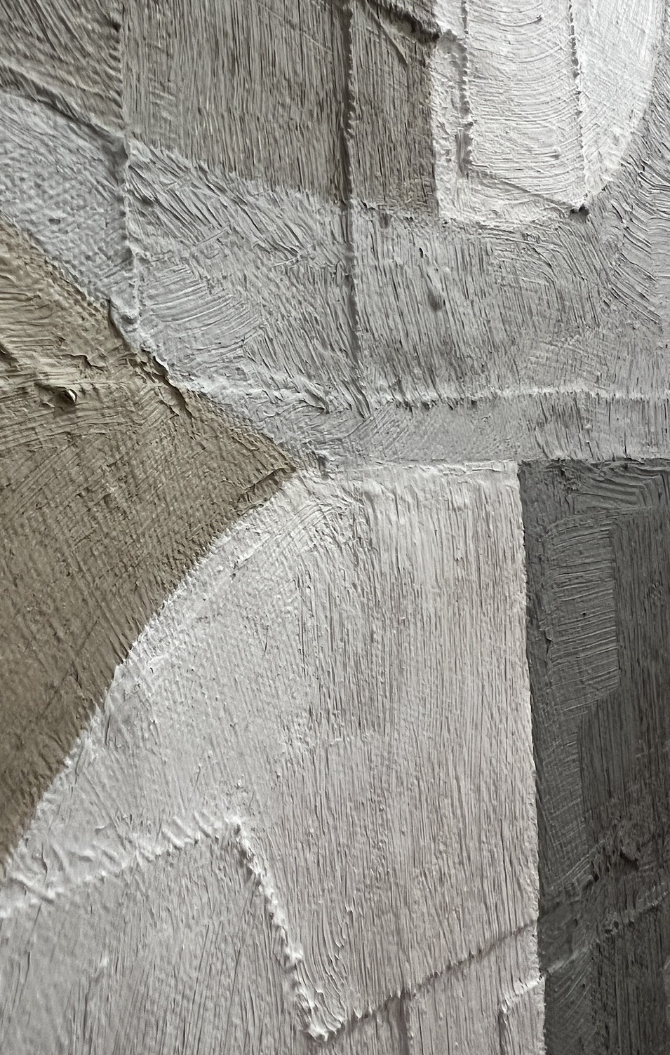 Close detail of neutral painted collage shapes